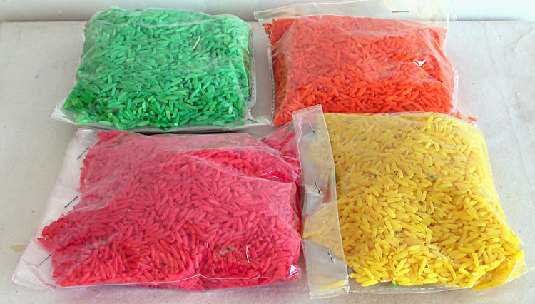 ...or like green, orange, pink or yellow on rice.  Gross.This looks like something confiscated by the cops.  Black market rice.